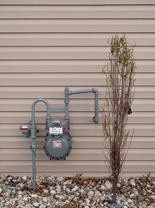 Natural gas regulator and meter unit.