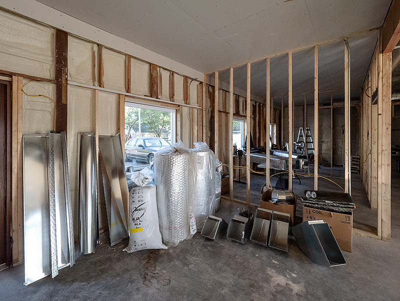 Sheetmetal and insulaton material that will be used for custom-made HVAC ductwork.